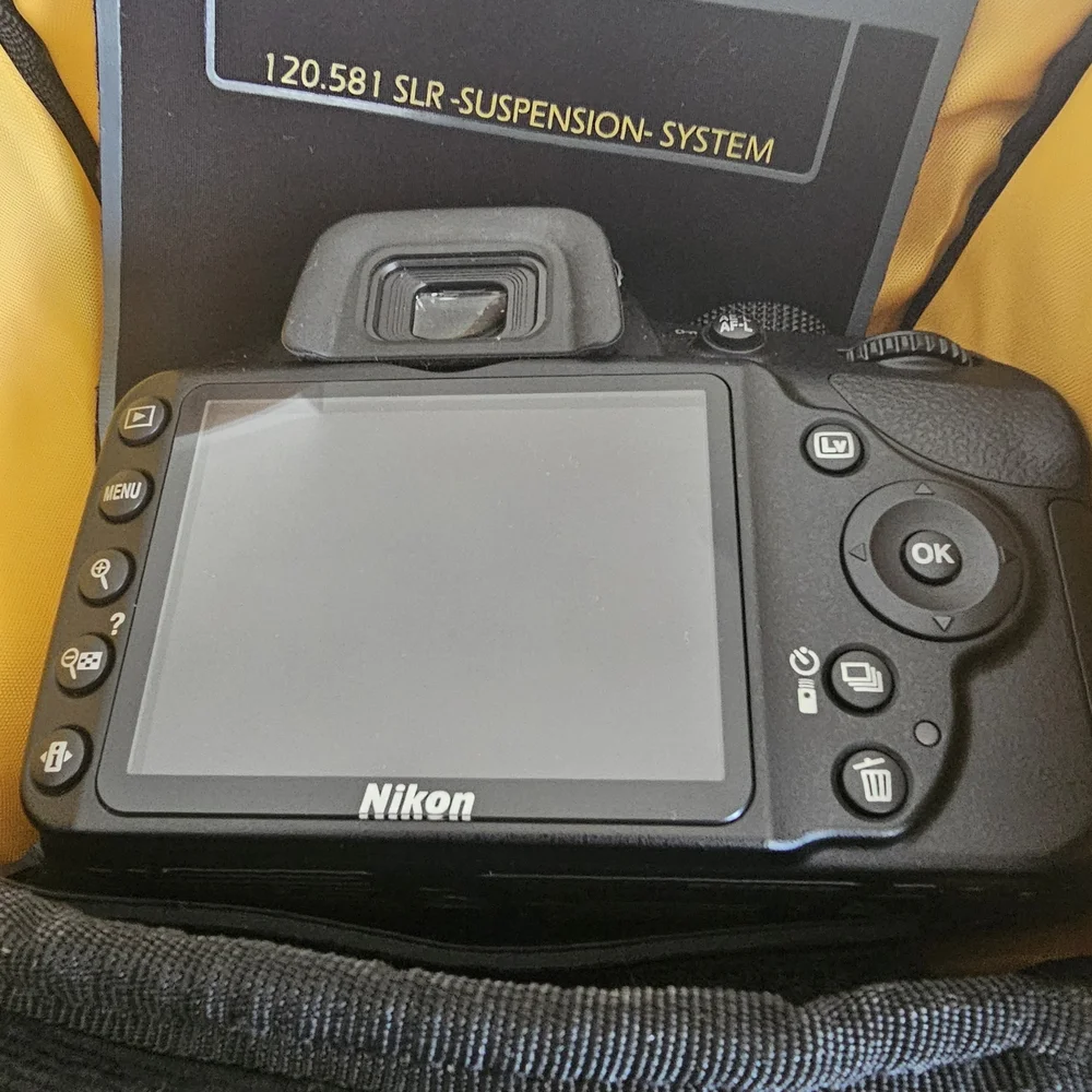 Nikon Black DSLR with Zoom Lens